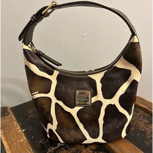 Dooney and Bourke Giraffe print handbag/purse. Dark brown and cream white. EUC